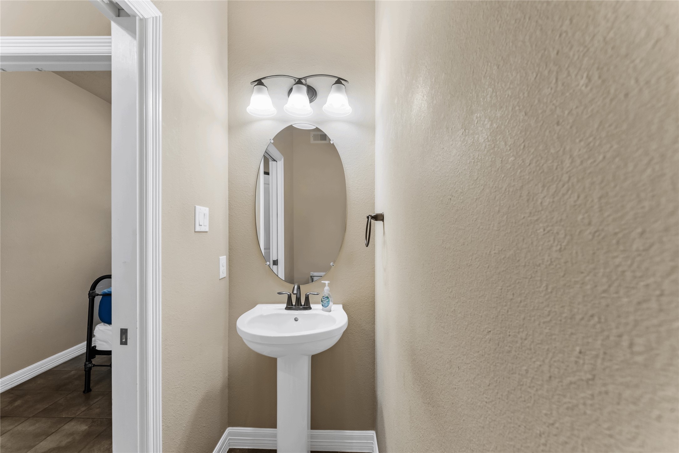 723 Audra Lane Spring, TX 77386 - Photo 13 of 35 a bathroom with a sink and mirror