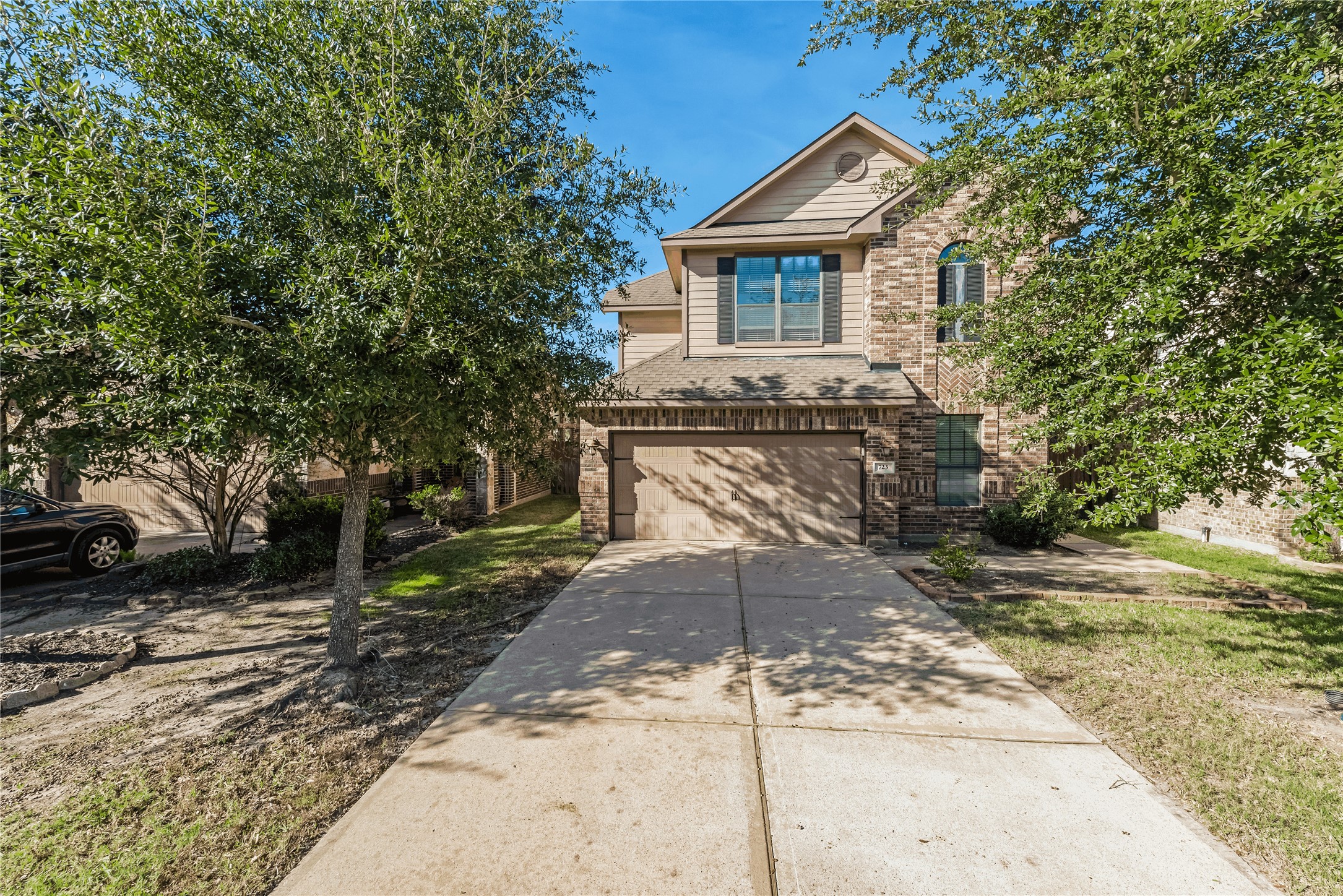 723 Audra Lane Spring, TX 77386 - Photo 2 of 35 a front view of a house with a yard