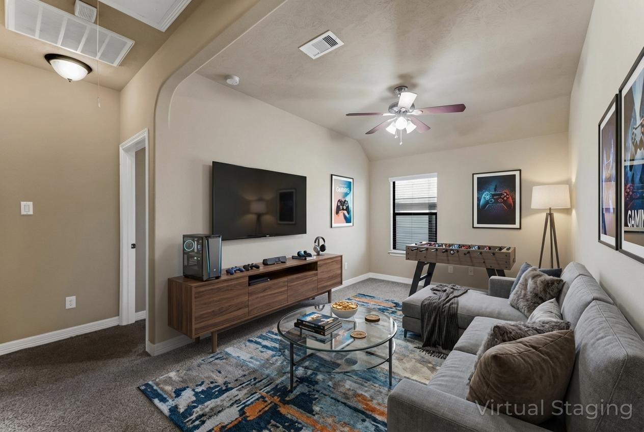 723 Audra Lane Spring, TX 77386 - Photo 26 of 35 a living room with furniture and a flat screen tv
