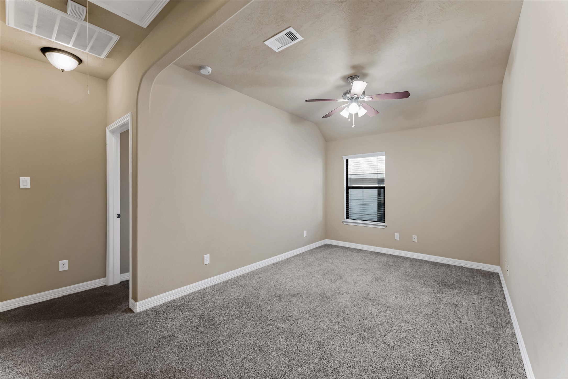 723 Audra Lane Spring, TX 77386 - Photo 27 of 35 a view of an empty room with a ceiling fan and window
