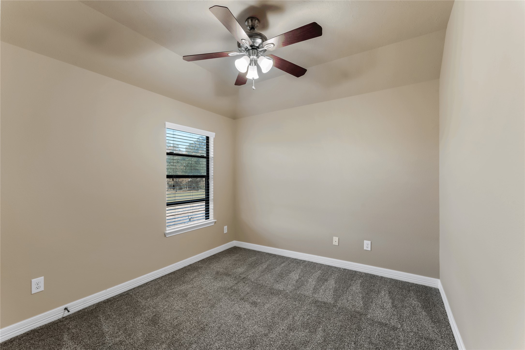 723 Audra Lane Spring, TX 77386 - Photo 33 of 35 an empty room with windows and ceiling fan