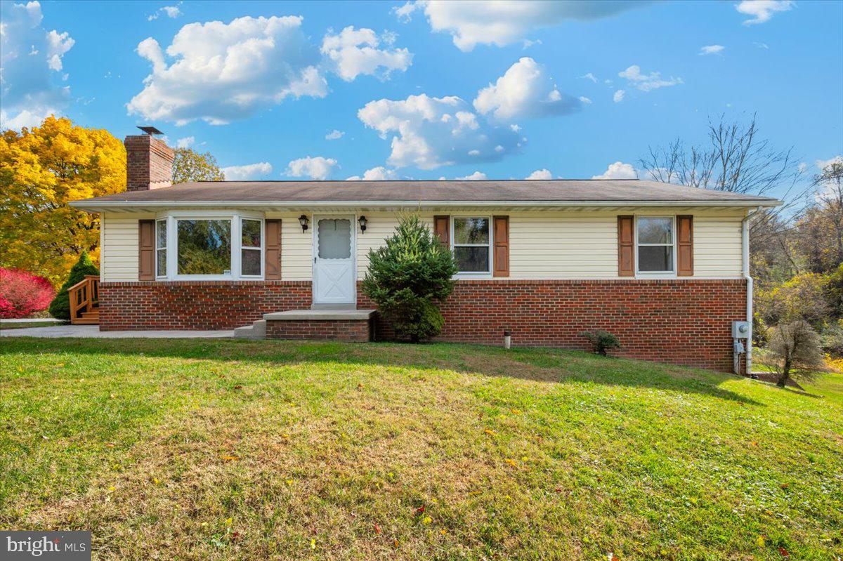 29007 Ridge Road Mount Airy, MD 21771 - Photo 1 of 50 a house view with a garden space
