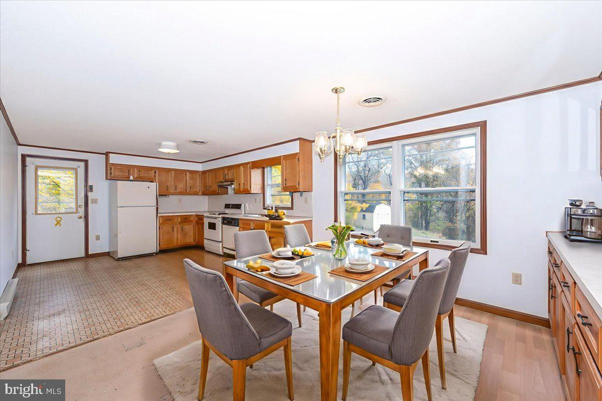 29007 Ridge Road Mount Airy, MD 21771 - Photo 11 of 50 a dining room with furniture and window