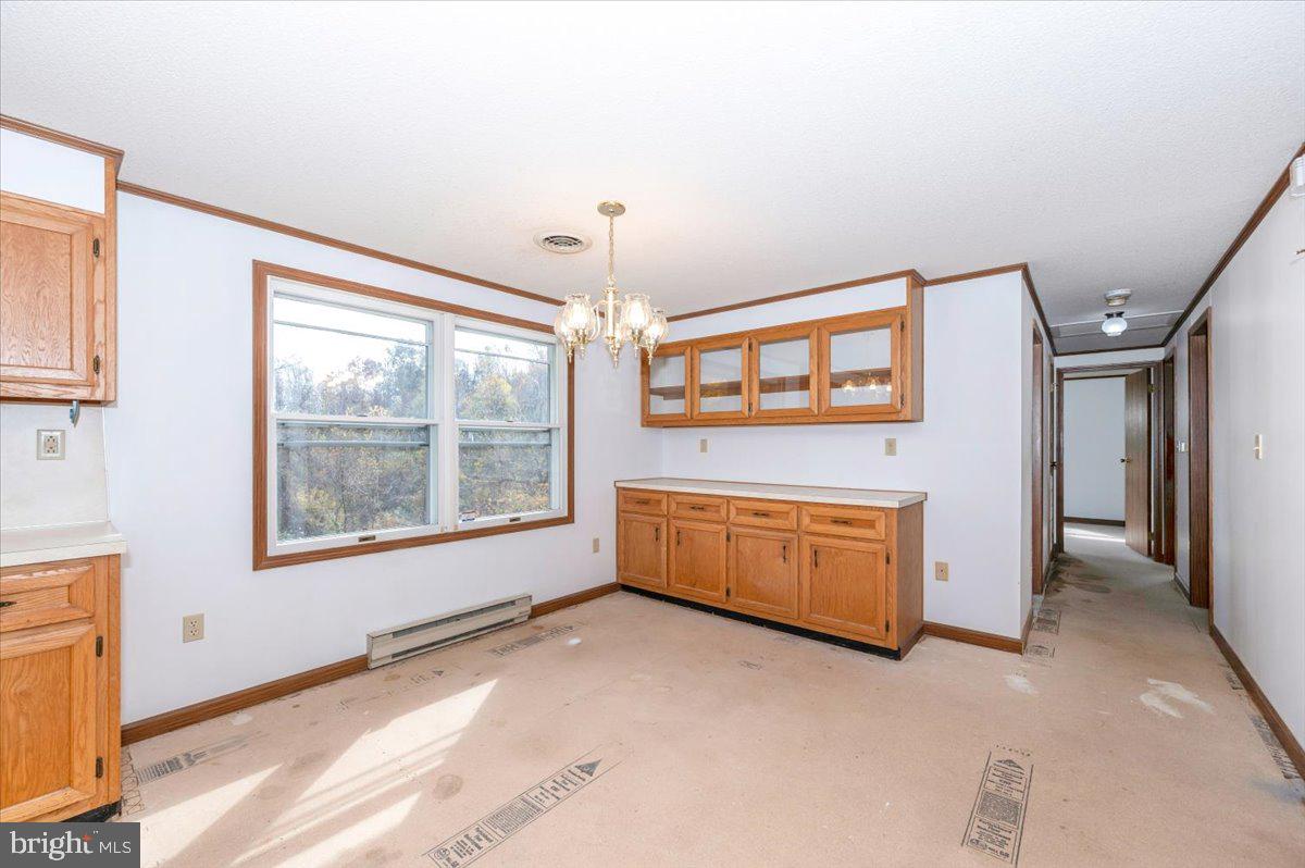 29007 Ridge Road Mount Airy, MD 21771 - Photo 16 of 50 a view of an empty room with a window
