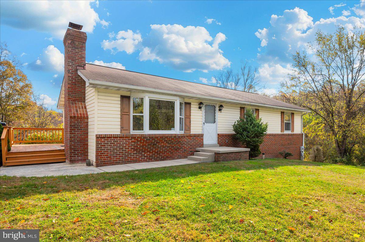 29007 Ridge Road Mount Airy, MD 21771 - Photo 3 of 50 a front view of house with yard and outdoor seating