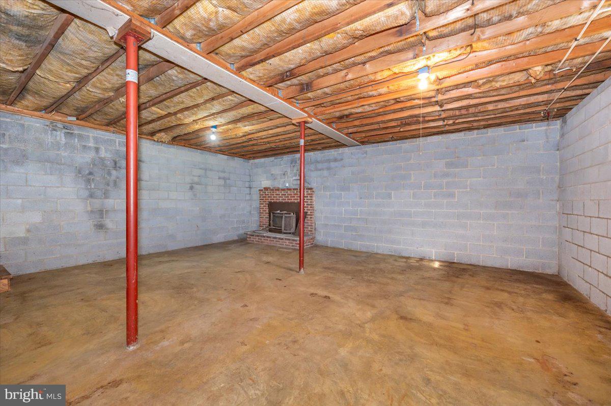 29007 Ridge Road Mount Airy, MD 21771 - Photo 35 of 50 a view of a room with a wooden roof and stairs