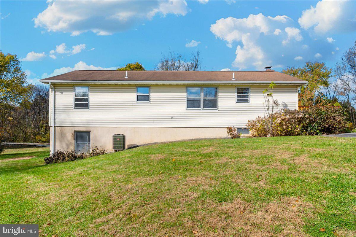 29007 Ridge Road Mount Airy, MD 21771 - Photo 41 of 50 a view of a house with a yard
