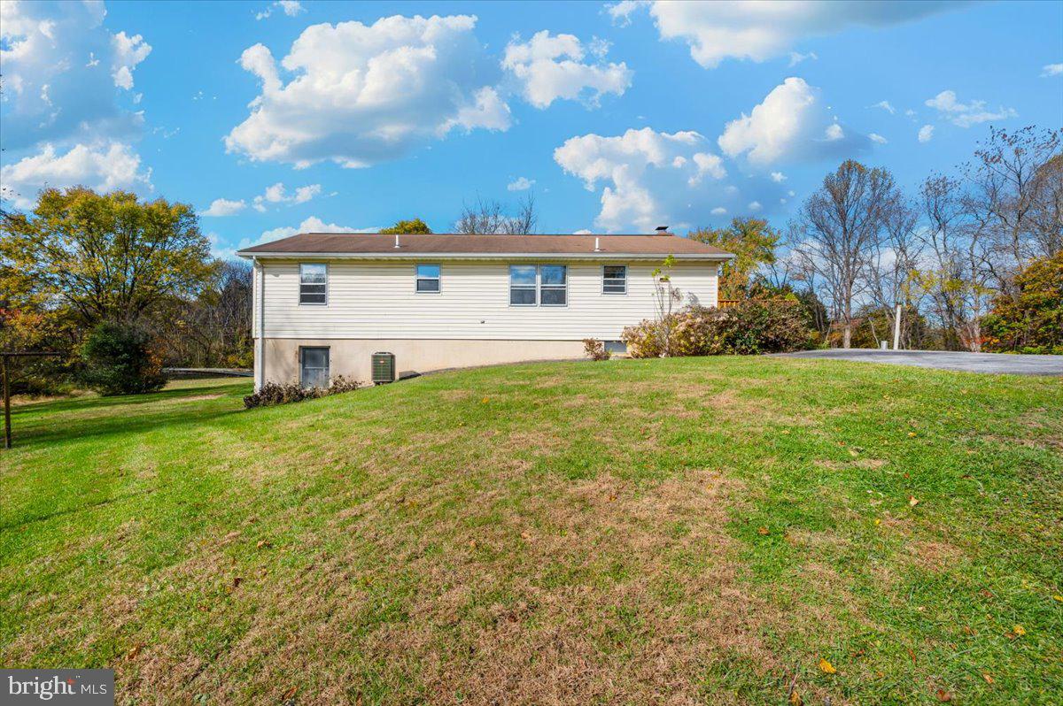 29007 Ridge Road Mount Airy, MD 21771 - Photo 43 of 50 a view of a house with a yard