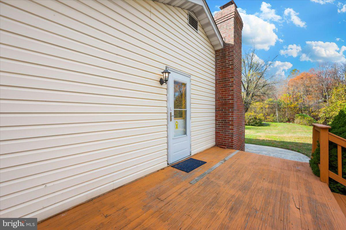 29007 Ridge Road Mount Airy, MD 21771 - Photo 44 of 50 a view of a garden with wooden deck