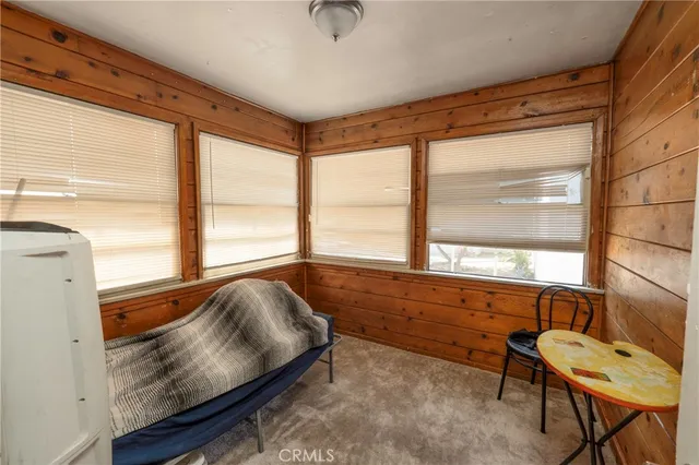 a living room with couch and a window