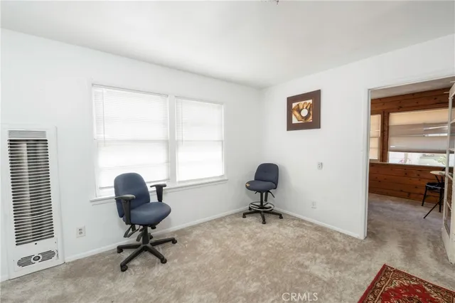a bathroom with a sink a vanity and a window