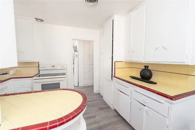 a bathroom with a bathtub and a sink