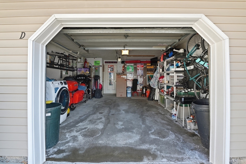 425 Main Street, Unit 21D Hudson, MA 01749 - Photo 19 of 21 a view of a storage room with a lot of stuff