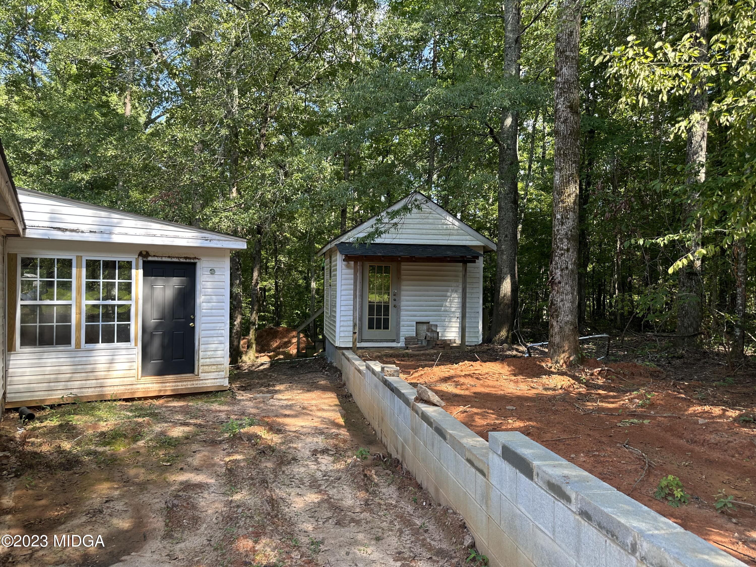 365 Taylor Road Juliette, GA 31046 - Photo 2 of 12 a view of a house with backyard and porch