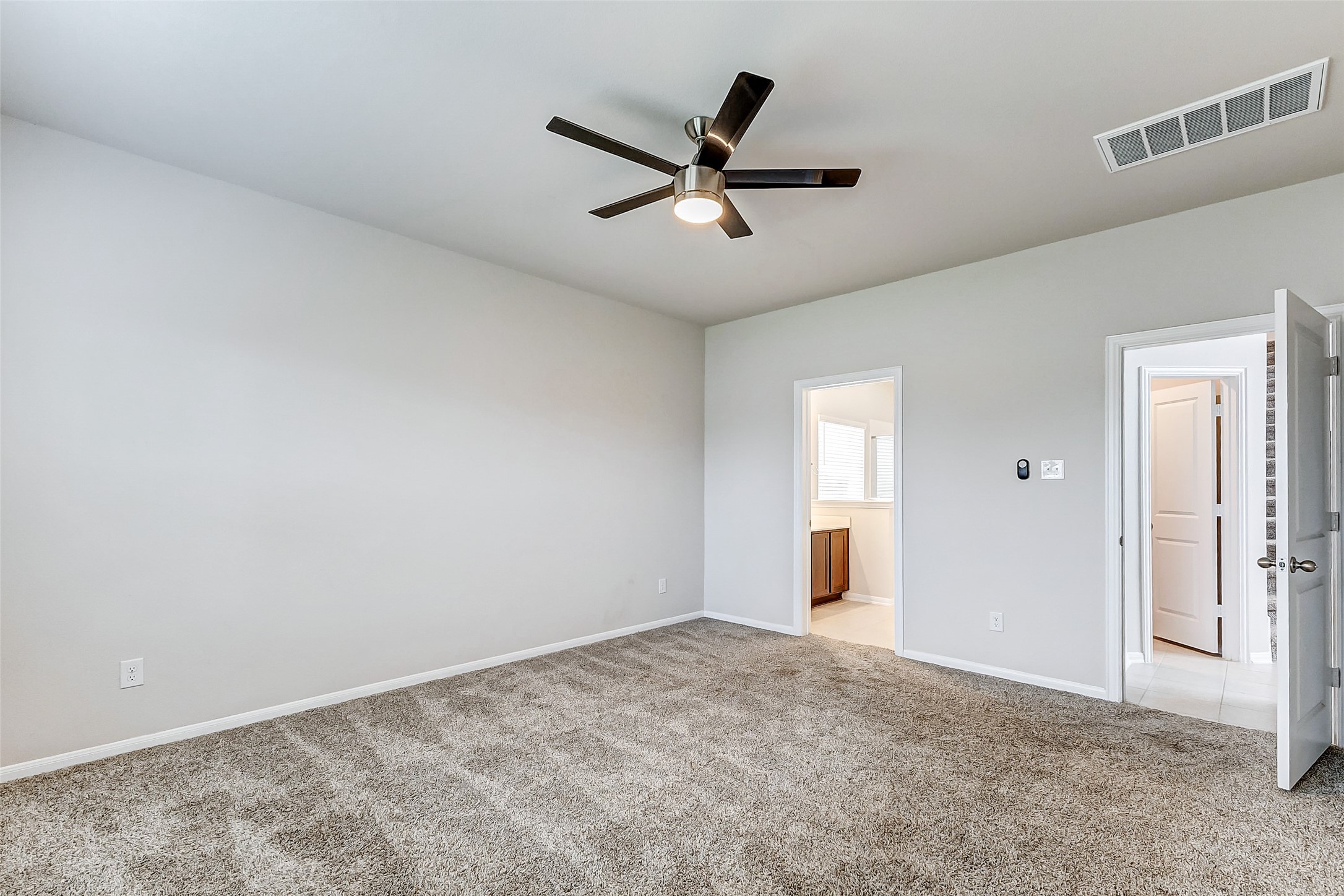 10511 Snowy Ridge Lane Rosharon, TX 77583 - Photo 15 of 32 a view of a livingroom with a ceiling fan and wooden floor