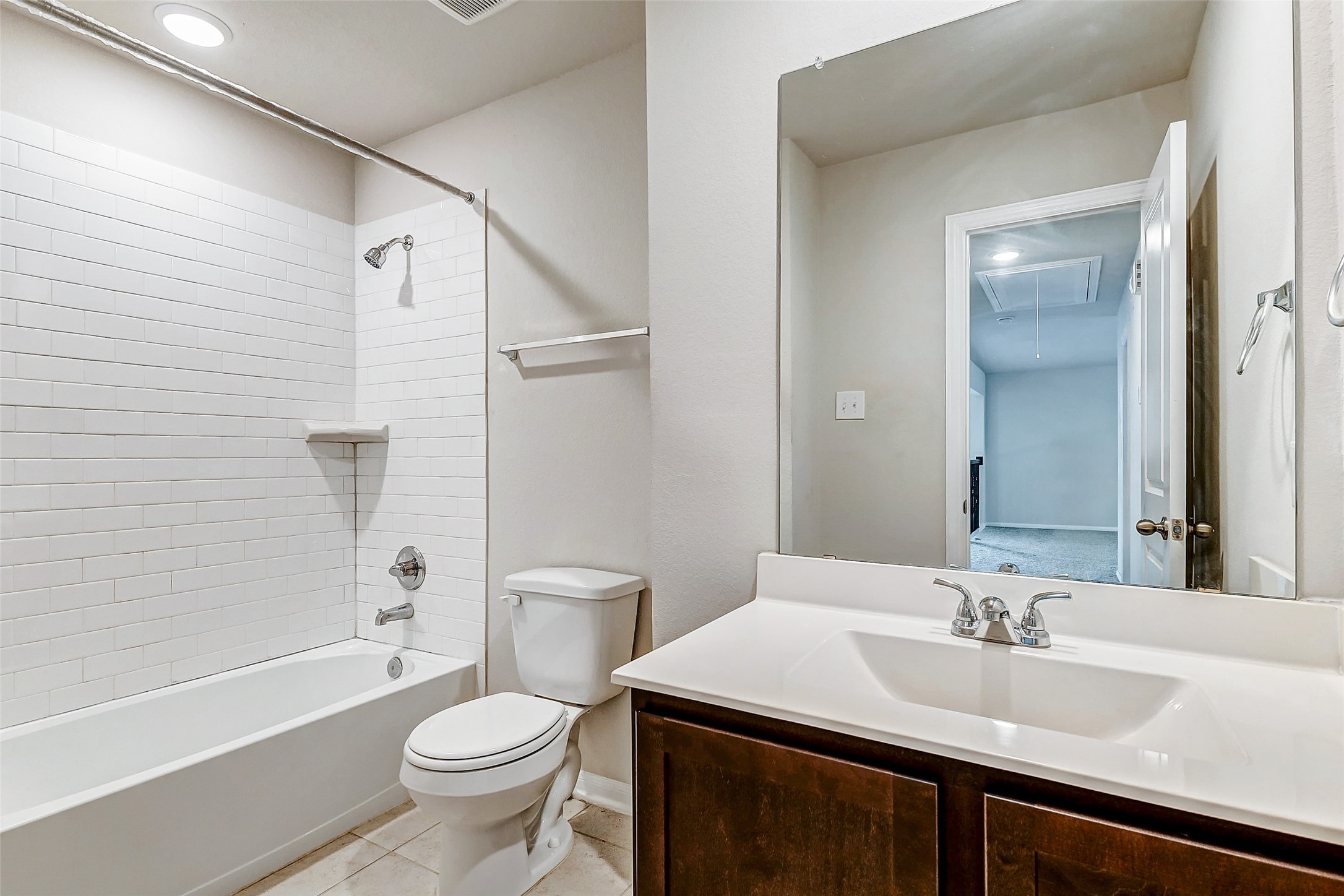 10511 Snowy Ridge Lane Rosharon, TX 77583 - Photo 26 of 32 a bathroom with a sink a toilet and shower