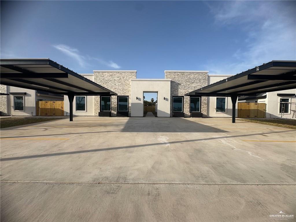 2109 Dragonfly St Mission, Unit 2 Mission, TX 78572 - Photo 1 of 16 a view of a house with more windows and a ceiling tree