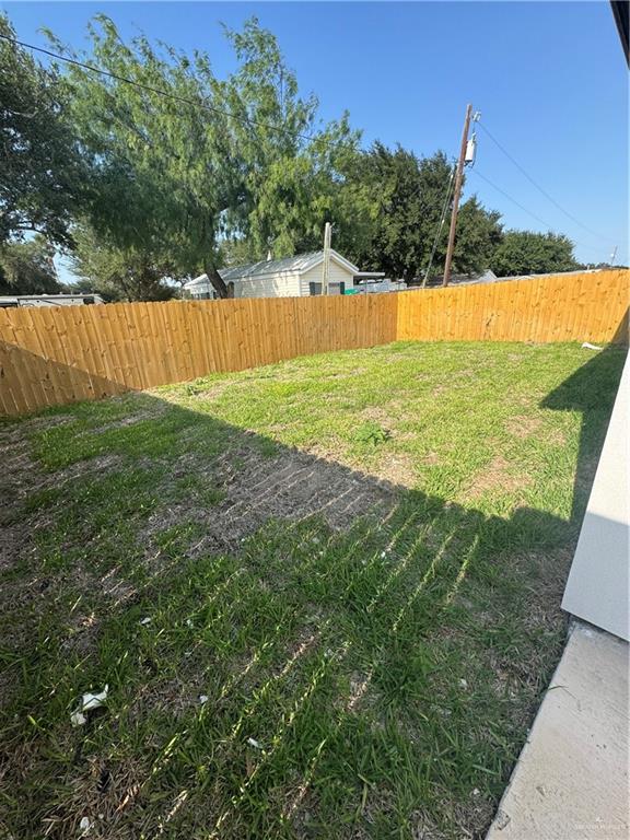 2109 Dragonfly St Mission, Unit 2 Mission, TX 78572 - Photo 15 of 16 a view of a field with an outdoor space