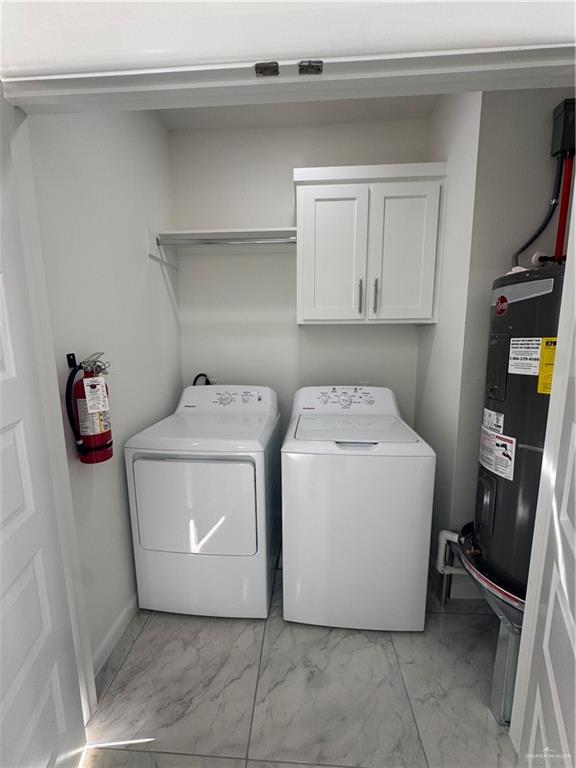 2109 Dragonfly St Mission, Unit 2 Mission, TX 78572 - Photo 4 of 16 a utility room with dryer and washer
