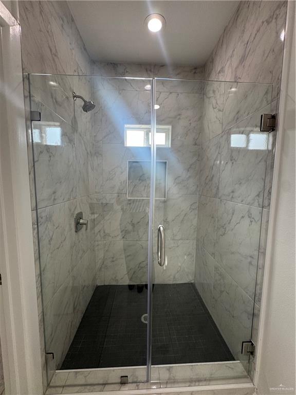 2109 Dragonfly St Mission, Unit 2 Mission, TX 78572 - Photo 9 of 16 a bathroom with a shower