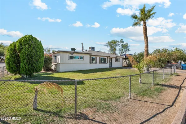 a view of a swimming pool with a lounge chairs