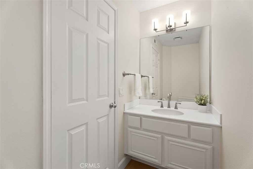 6 Stoney Pointe Laguna Niguel, CA 92677 - Photo 15 of 37 a bathroom with a sink and a mirror