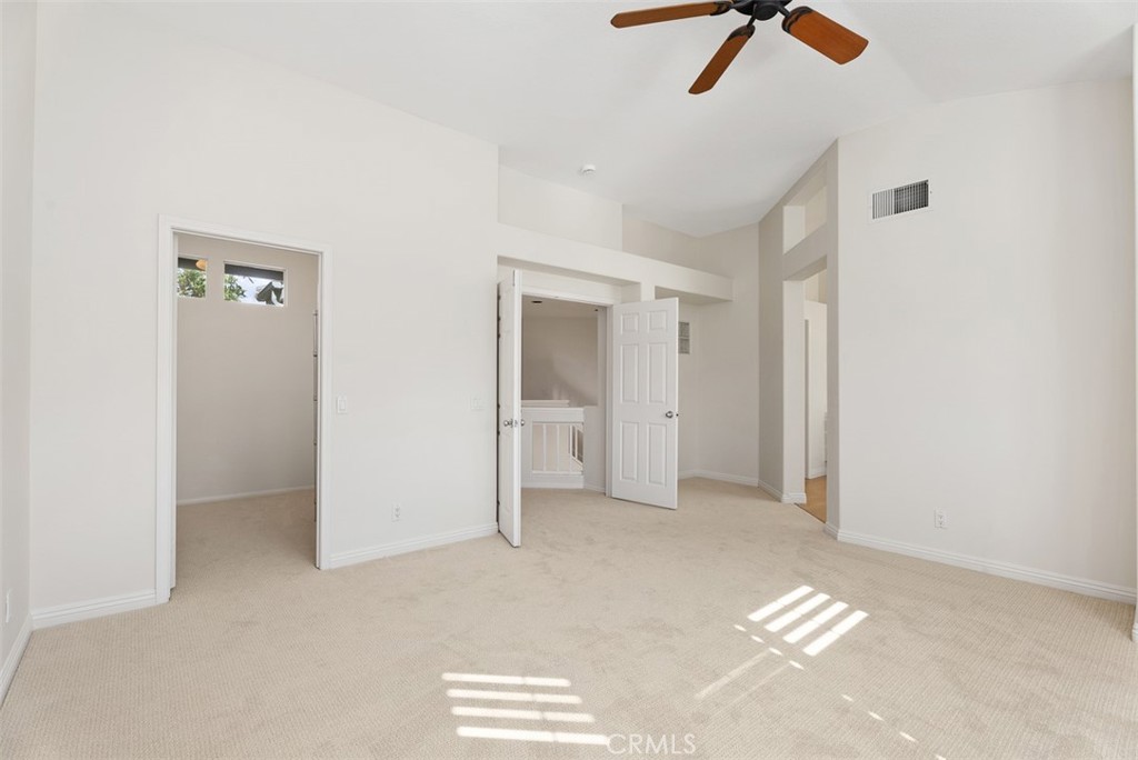 6 Stoney Pointe Laguna Niguel, CA 92677 - Photo 19 of 37 a view of empty room with ceiling fan
