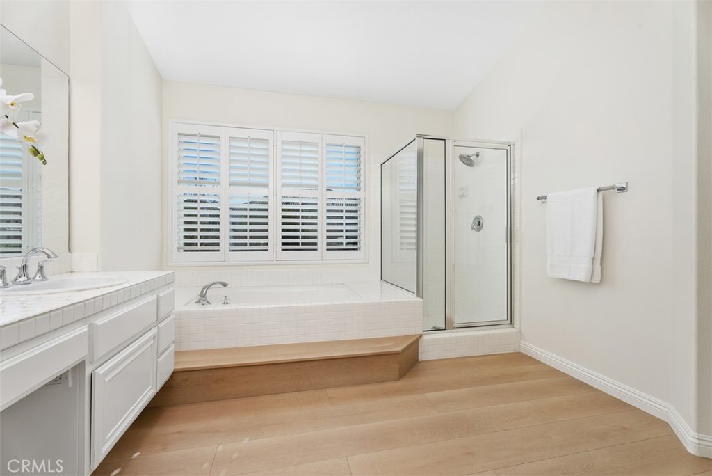 6 Stoney Pointe Laguna Niguel, CA 92677 - Photo 24 of 37 a spacious bathroom with a bathtub and a shower