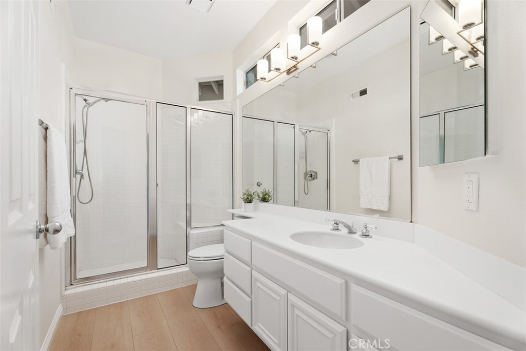 6 Stoney Pointe Laguna Niguel, CA 92677 - Photo 29 of 37 a bathroom with a sink a toilet and shower