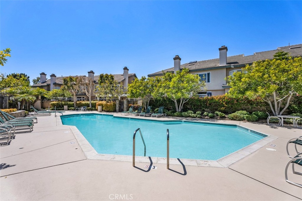 6 Stoney Pointe Laguna Niguel, CA 92677 - Photo 35 of 37 a view of swimming pool with outdoor seating and plants