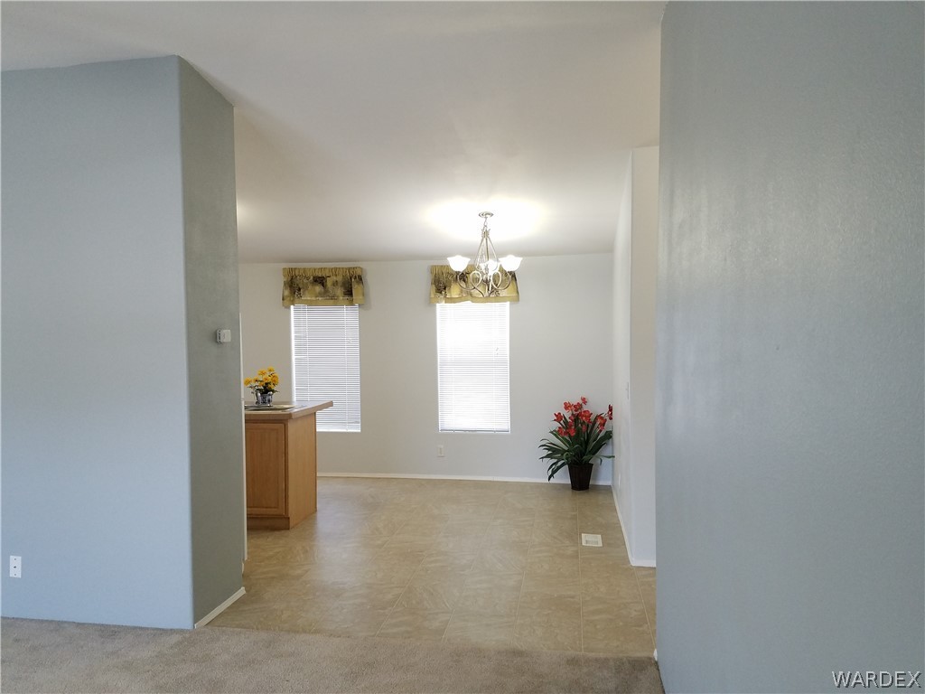 3955 Bosque Road Golden Valley, AZ 86413 - Photo 5 of 27 a view of a room that has a window