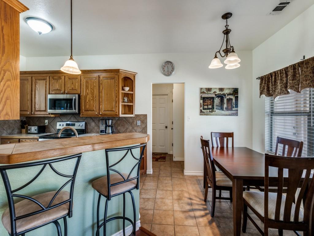 100 County Road 4181 Decatur, TX 76234 - Photo 11 of 35 a dining room with furniture a chandelier and window