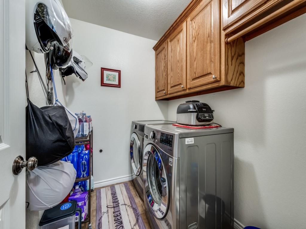 100 County Road 4181 Decatur, TX 76234 - Photo 23 of 35 a view of walk in closet with clothes and shoes