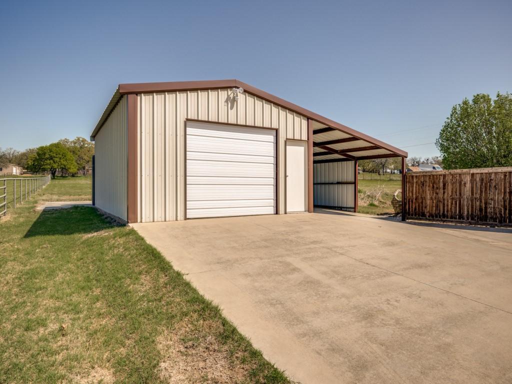 100 County Road 4181 Decatur, TX 76234 - Photo 34 of 35 a view of a house with backyard and wooden fence