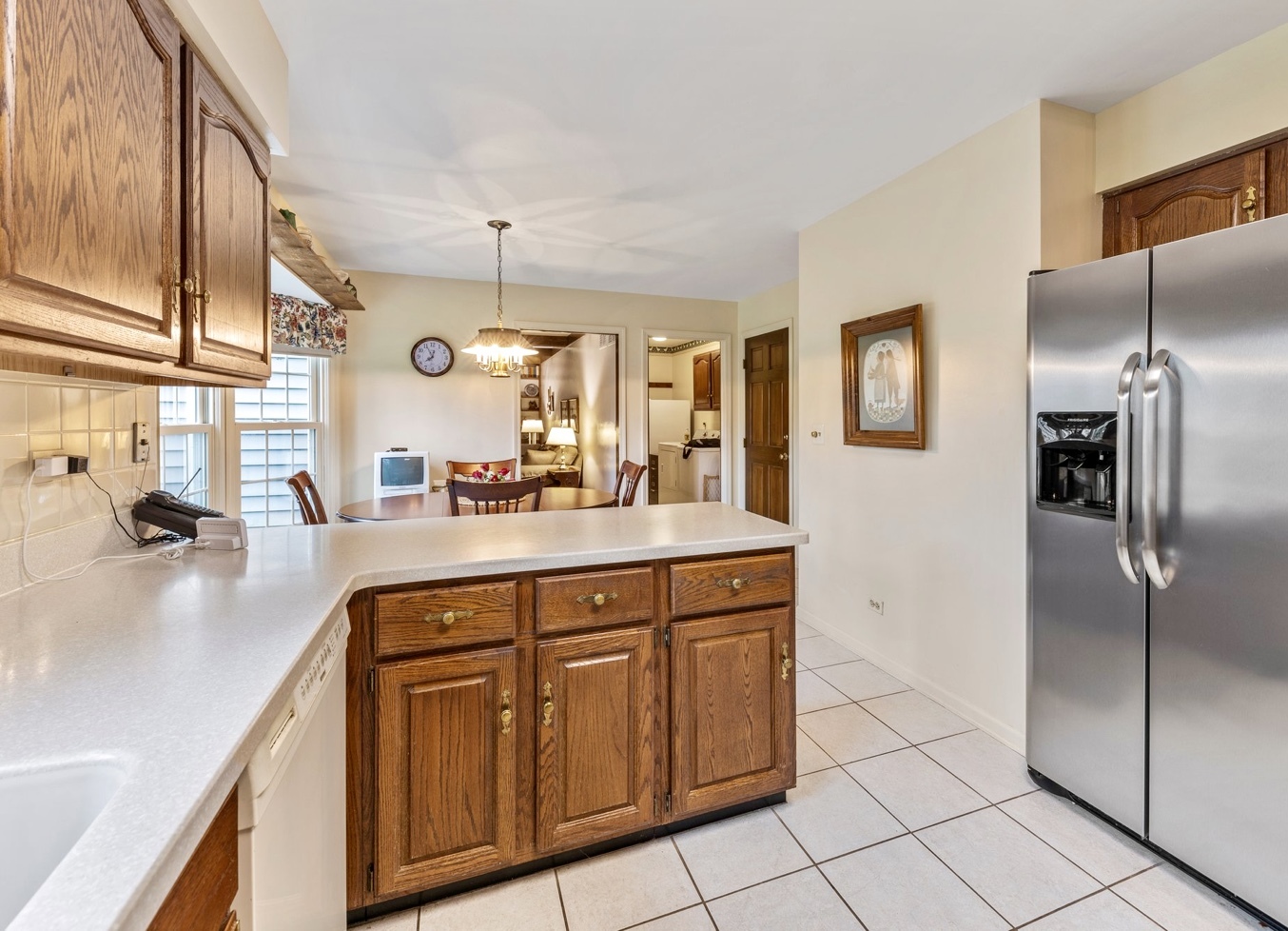 1580 Clemson Drive Naperville, IL 60565 - Photo 13 of 34 a living room with furniture and a large window