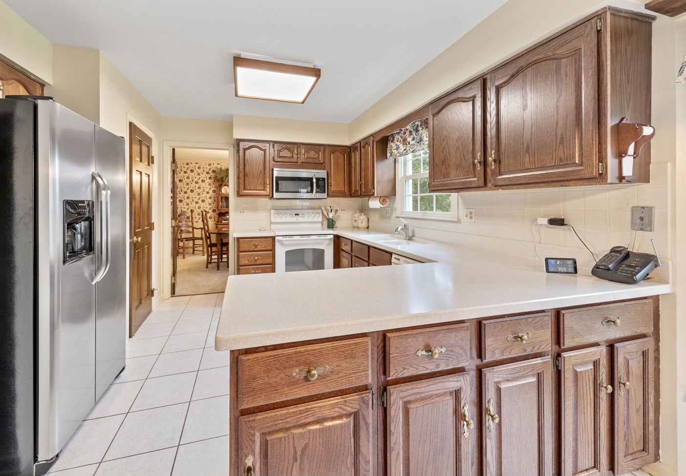 1580 Clemson Drive Naperville, IL 60565 - Photo 14 of 34 a bedroom with bed and window