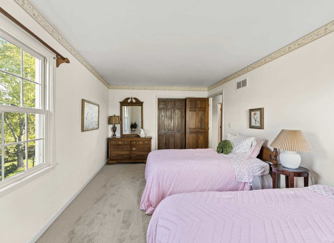 1580 Clemson Drive Naperville, IL 60565 - Photo 29 of 34 a bathroom with a sink and a mirror