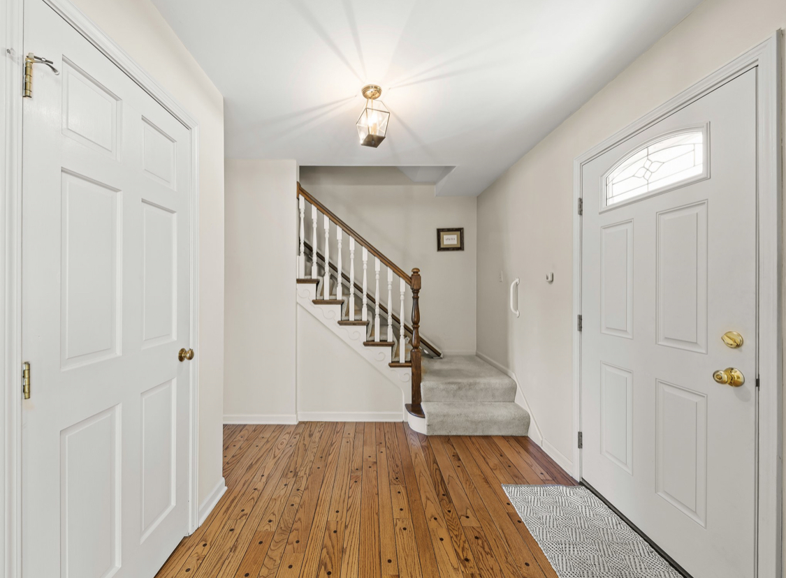 1580 Clemson Drive Naperville, IL 60565 - Photo 5 of 34 a view of entryway with wooden floor