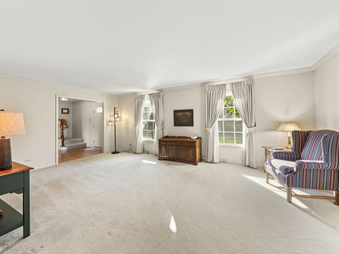 1580 Clemson Drive Naperville, IL 60565 - Photo 7 of 34 a view of a livingroom with furniture and toys
