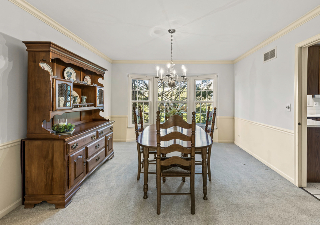 1580 Clemson Drive Naperville, IL 60565 - Photo 8 of 34 a large bedroom with furniture and fireplace