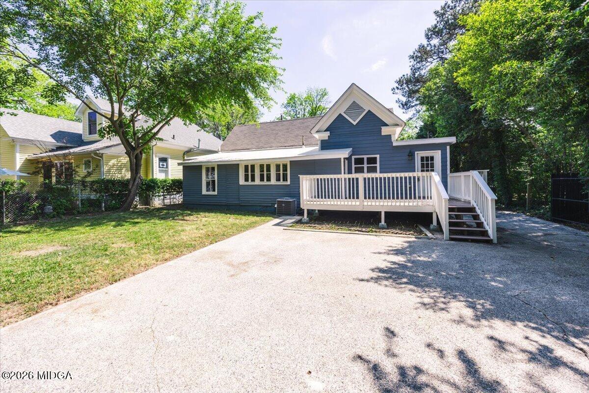243 Cleveland Avenue Macon, GA 31204 - Photo 41 of 43 a view of a house with a yard and large tree