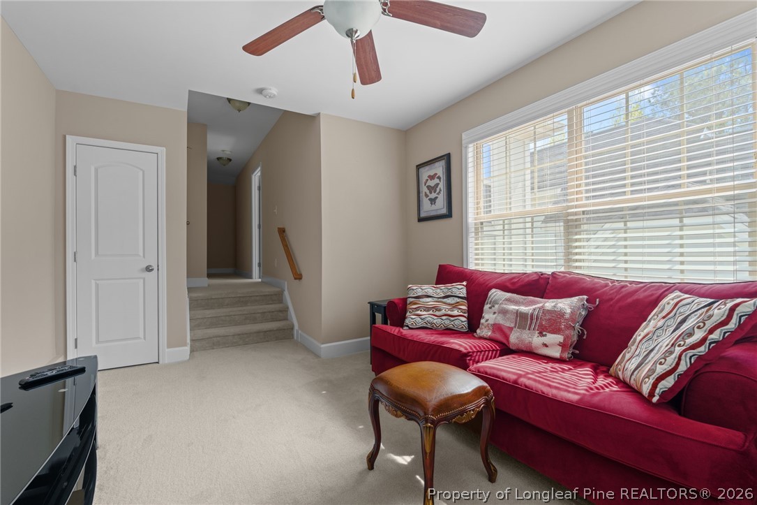 126 Pine Hawk Drive Spring Lake, NC 28390 - Photo 28 of 48 a living room with furniture and a window
