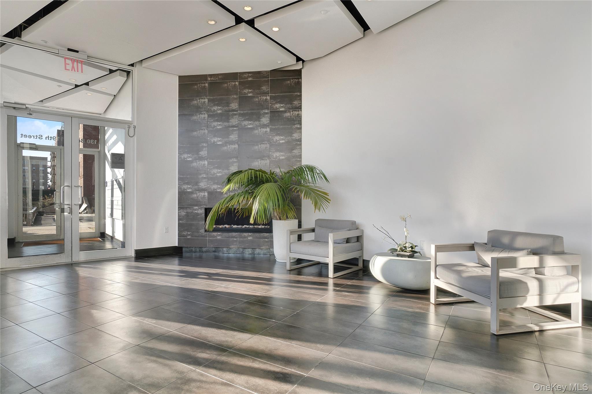 118-20 Ocean Promenade, Unit 5D Queens, NY 11694 - Photo 15 of 17 Lobby with recessed lighting and tile walls