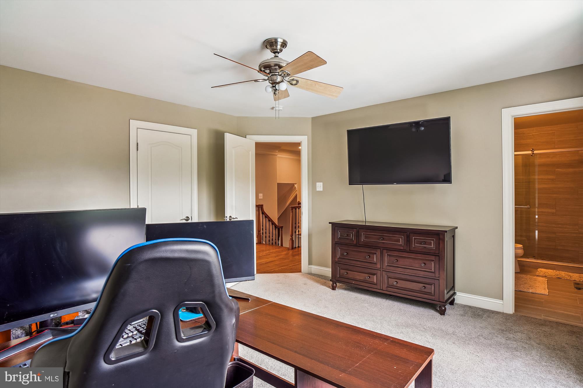 3508 Kemptown Church Road Monrovia, MD 21770 - Photo 69 of 111 a living room with furniture a flat screen tv and a fireplace