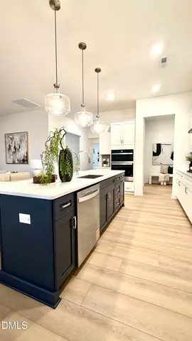 a bedroom with a large bed and a large window