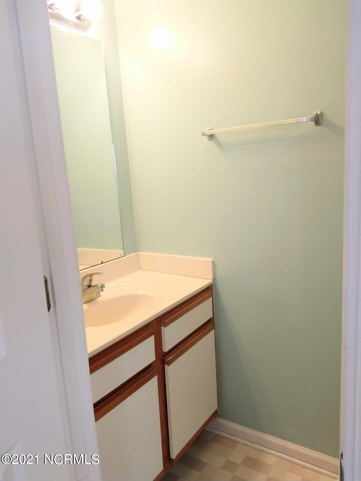 63 Pirates Cove Drive Swansboro, NC 28584 - Photo 5 of 13 down stairs half bath