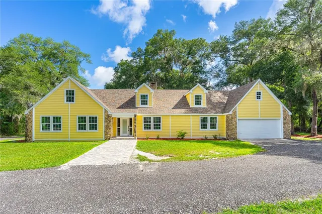 a view of outdoor space yard and front view of a house