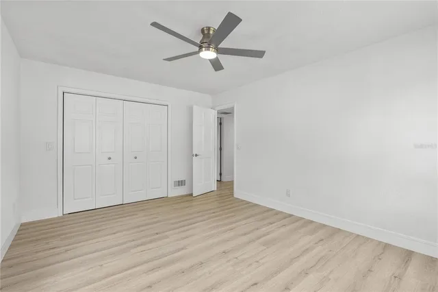 a bathroom with a granite countertop sink mirror and double