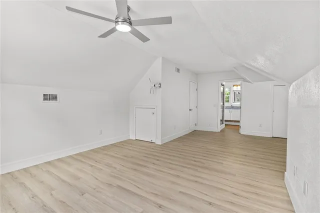 a bathroom with a sink and a window