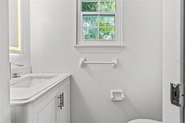 a view of a house with backyard porch